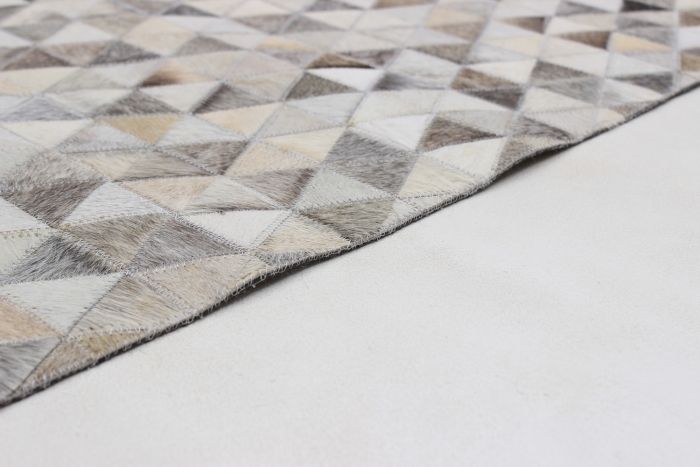 Argentina Cowhide Patchwork 5'2" x 8'1" Handmade Leather Rug 