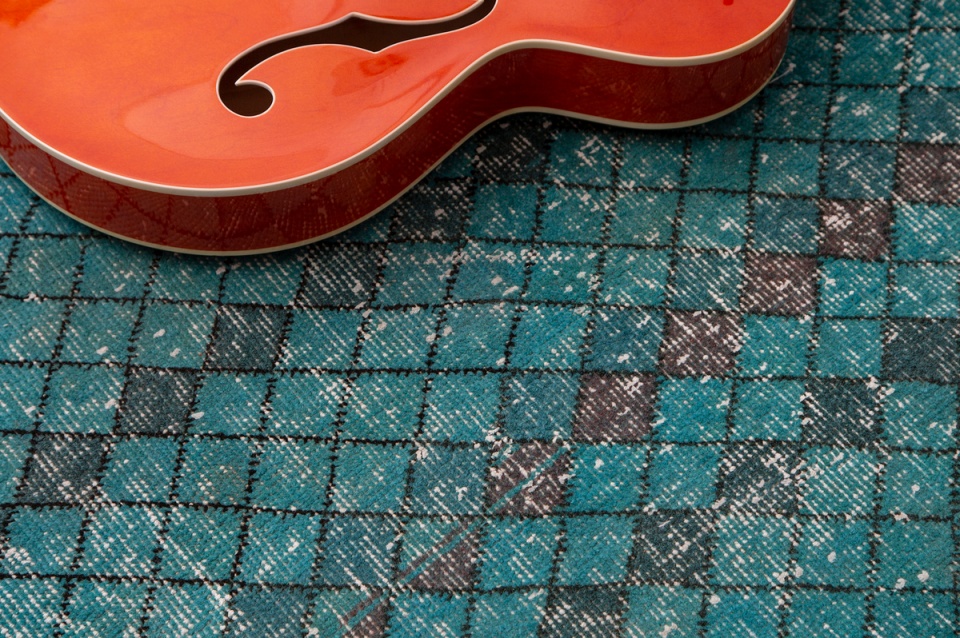 ECARPETGALLERY Overdyed rug and acoustic guitar