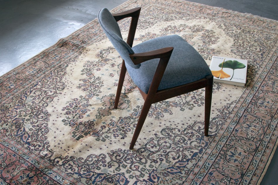ECARPETGALLERY Turkish Kayseri Vintage rug in studio paired with chair